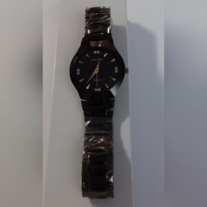 Black and Gold Watch with Sleek Design